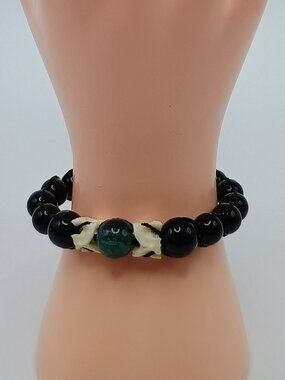 Spiritual Amulet Bracelet with Carved Black Onyx and Green Jade